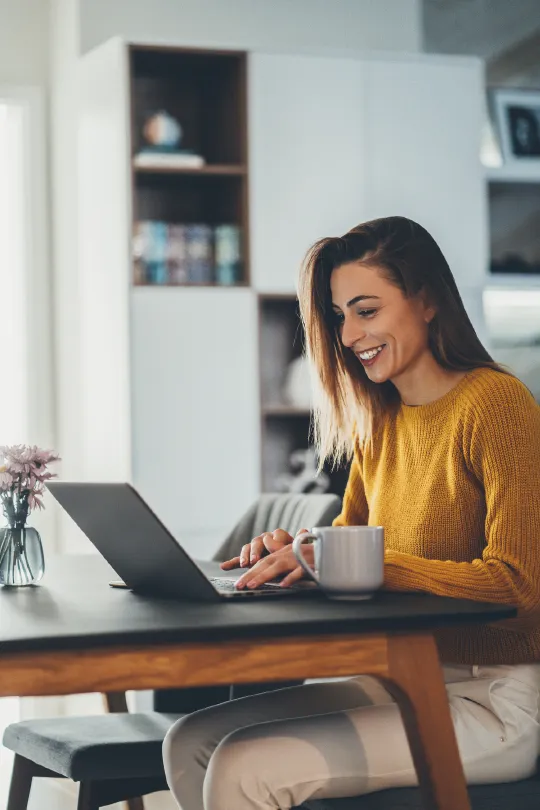 Professional working remotely with a laptop