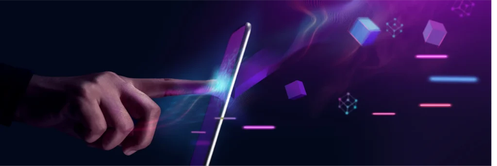Hand interacting with a laptop surrounded by glowing digital graphics.